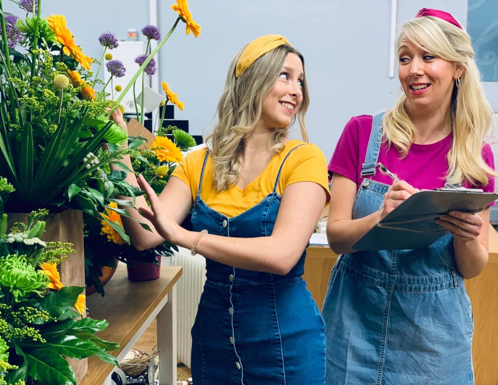 Audrey and Ronette prepare the Flower Shop